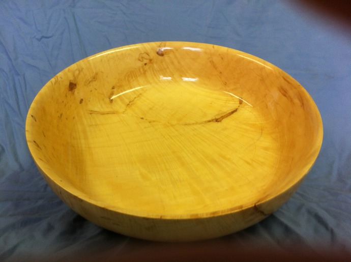 Hand-turned chestnut bowl with natural grain