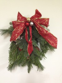 Original photograph of a Four B’s Farm fir door charm with bow and snowflakes