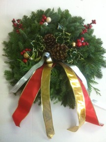 Handmade Noble fir wreath with holly, cones, and ribbon